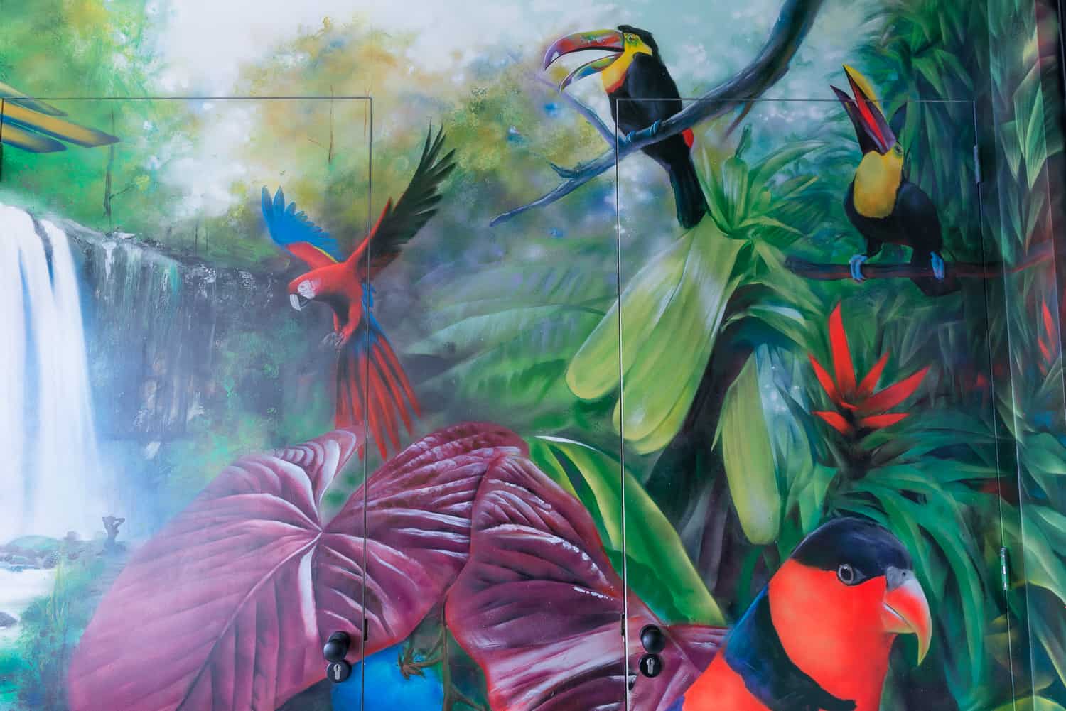 Image of a rain forest designed and painted by Telmo & Miel as found in the entrance of the Blue Tomato Coffeeshop in Hoorn