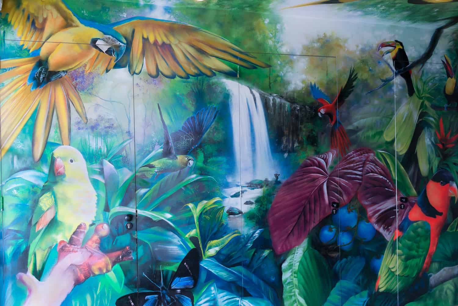 Image of a rain forest designed and painted by Telmo & Miel as found in the entrance of the Blue Tomato Coffeeshop in Hoorn