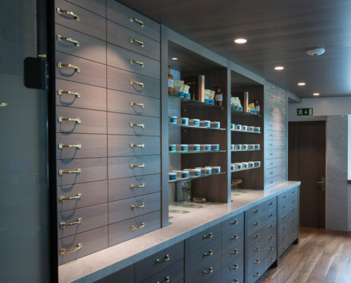 Modern Pharmacy styled counter at the Blue Tomato Coffeeshop in Hoorn